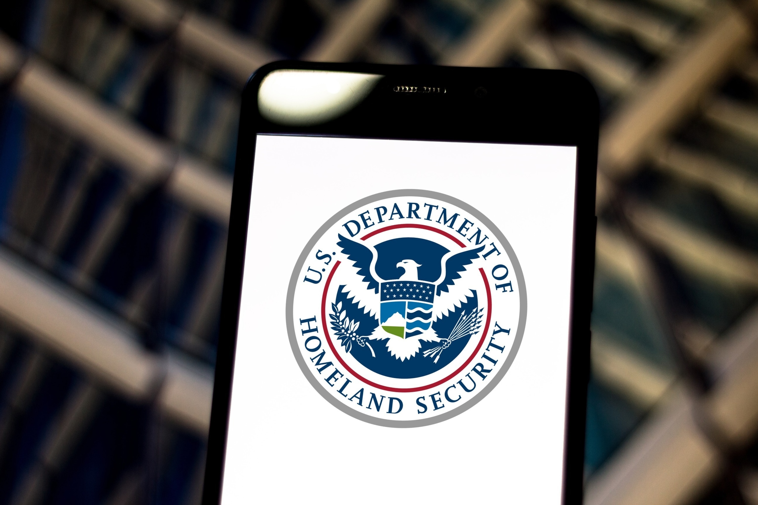 PHOTO: In this photo illustration on May 24, 2019 the United States Department of Homeland Security (DHS) logo is seen displayed on a smartphone.